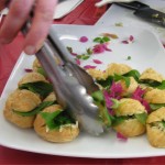 Gougere with wild leaves and salmonberry blossoms