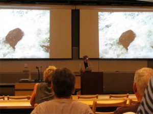 Marlene Creates lectures with headlamp
